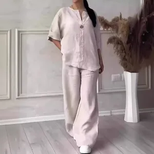 Detail of comfortable loose cotton linen set with V-neck top and wide-leg pants