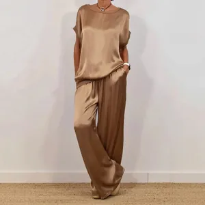 Elegant satin women's two-piece set featuring loose top and wide-leg pants in bronze color.