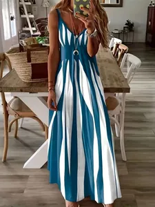 Full body view of a summer blue and white geometric print V-neck sleeveless maxi dress