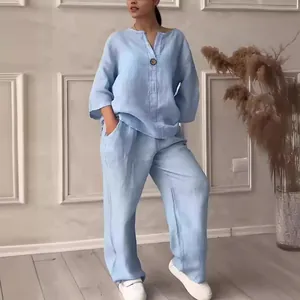 Light blue loose cotton linen two-piece set with V-neck top and wide-leg trousers