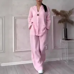 Detailed view of women's pink loose cotton linen loungewear set with wide-leg trousers