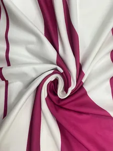 Macro detail view of soft striped fabric texture showing magenta and white print pattern