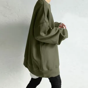 Side view of an oversized olive green crewneck pullover sweatshirt for women chic