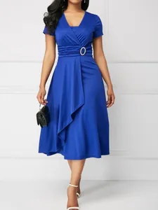 Elegant royal blue V-neck midi dress with asymmetrical skirt and waist buckle decoration.