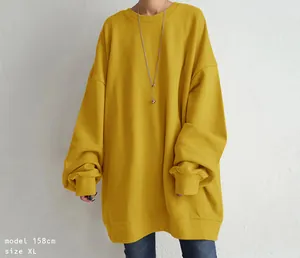 Oversized yellow crewneck sweatshirt for women, casual winter fashion style