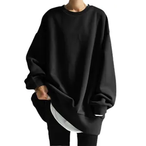 Chic oversized black crewneck sweatshirt for women featuring a stylish white layered hem