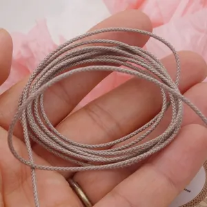 Dettaglio del cordoncino di cotone intrecciato grigio da 1,2 mm a 1,8 mm per fai da te