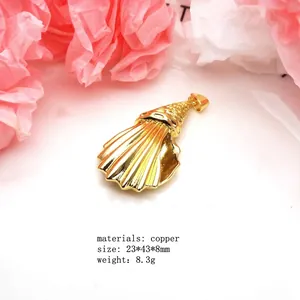 Close-up detail view of a polished golden copper seashell pendant for fashion necklaces