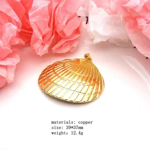 Gold copper seashell pendant detail showing texture, size 39x37mm and 12.4g weight