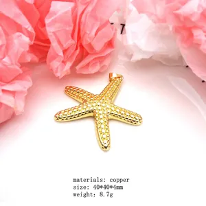 Detailed macro view of a golden copper starfish pendant with size and weight parameters