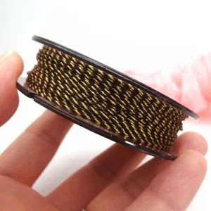 Macro view of 0.8mm gold-threaded braided Milan rope for DIY jewelry making