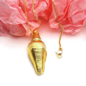 Elegant gold-plated copper conch shell pendant necklace with delicate box chain.