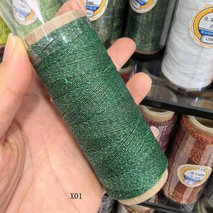 Close-up of green and gold 0.4mm metallic braided wax cord for DIY jewelry making