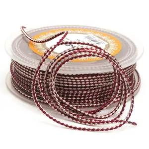Close-up detail of 1.5mm red and silver braided dragon pattern cord for jewelry making