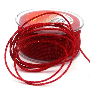 Detail of 1.5mm red Milan cord with gold silk for jewelry making