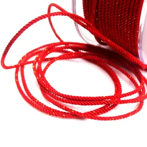 Close-up detail of 1.5mm red Milan rope with gold metallic thread for DIY jewelry making