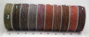 Collection of mixed color cotton cords with gold metallic threads for DIY jewelry making.