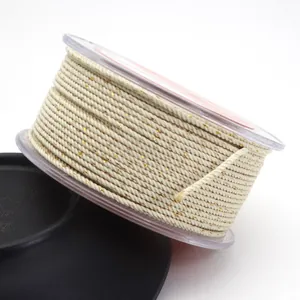 Detail view of 1.5mm cream Milanese cord with gold thread accents for jewelry making DIY projects