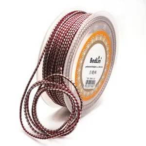 Professional 1.5mm dragon pattern braided cord on a spool for DIY jewelry making.
