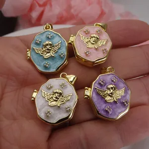 Detail view of gold-plated angel locket pendants in four colors with zircon stones