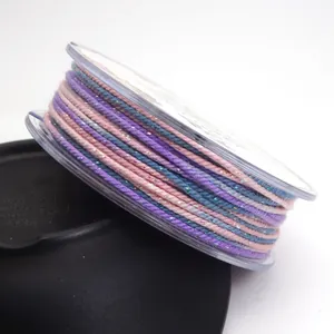 Close-up of 1.2mm space-dyed cotton cord with metallic glitter for jewelry making