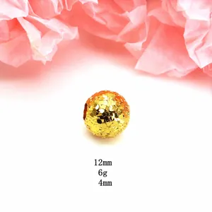 Close-up of golden dragon scale textured bead with 12mm 6g 4mm specifications