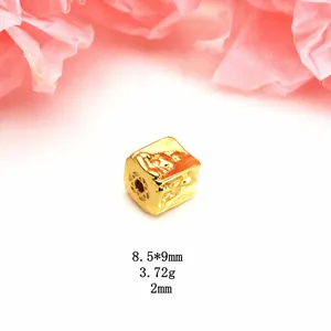 Macro view of a gold-plated baroque spacer bead showing 8.5x9mm size and 3.72g weight details