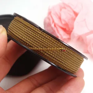 Detailed view of 1.5mm golden metallic Mambo cord for DIY bracelet weaving projects