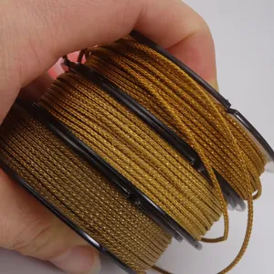 1.5mm gold metallic mambo cord for DIY jewelry braiding, three spools shown in hand