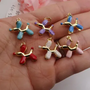 Detailed macro view of colorful enamel balloon dog charms for bracelets and necklaces