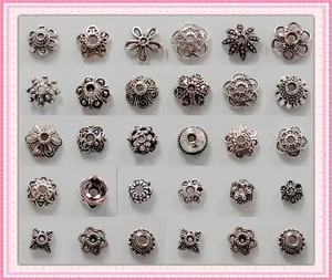 Variedad de capuchones y espaciadores de flores de plata tibetana para joyas DIY