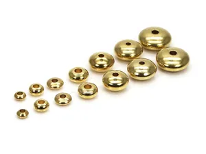 Detailansicht verschiedener Messing-Abakusperlen-Zwischenstücke für DIY-Schmuck