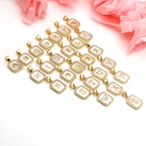 Collection of 26 English letter pendants with CZ and shell inlay for necklaces, gold plated
