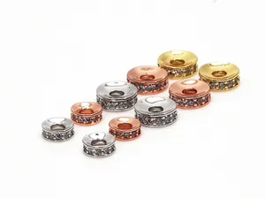 Macro view of micro-pave cubic zirconia spacer beads in silver, gold, and rose gold