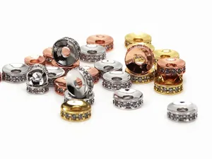 Macro view of micro-pave cubic zirconia spacer beads in gold, silver and rose gold finishes