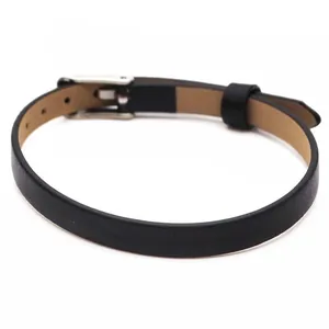 Detail view of a slim black leather bracelet with a silver adjustable metal buckle.