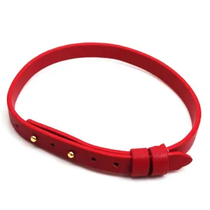 Minimalist thin red leather belt bracelet with gold-tone studs for men and women