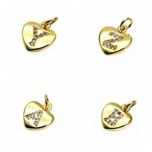 Close-up of heart-shaped alphabet charms with micro-pave zircons for DIY jewelry