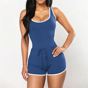 Close-up of sleeveless blue romper jumpsuit with white trim and drawstring waist