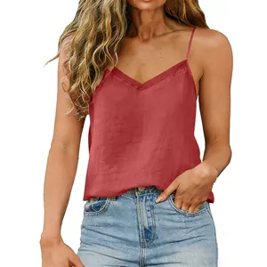 Close-up detail of a red V-neck cotton linen camisole top with thin spaghetti straps