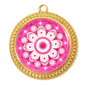 Detailed close-up of a pink mandala evil eye pendant with golden fluted edges for DIY jewelry.