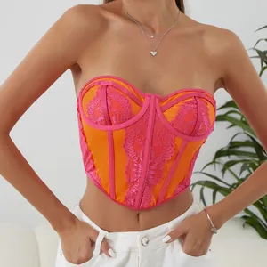 Detailed view of color-block lace corset top with underwire and boning structure.