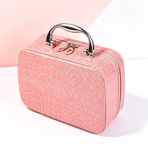Pink stone pattern portable cosmetic case with chrome metal handle and double zippers closure
