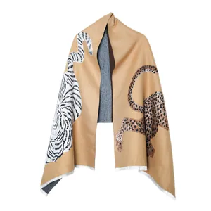 Detailed view of jacquard shawl featuring stylish white tiger and leopard animal prints.