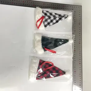 Set of plaid Santa hat cutlery holders for festive Christmas table decorations and gifts