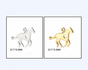 Detail view of two horse-shaped stainless steel pendants in silver and gold finishes.