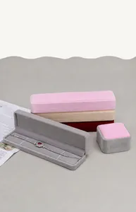 Detailed display of premium velvet jewelry boxes in various colors for gift storage
