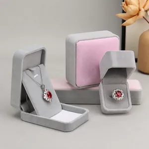 Elegant grey velvet jewelry boxes set with rounded corners for rings and necklaces