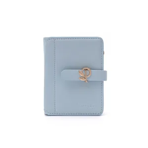 Front view of a light blue PU leather short wallet featuring a decorative leaf clasp
