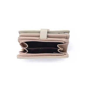 Interior detail of women's beige PU leather wallet with card slots and a zipper pocket